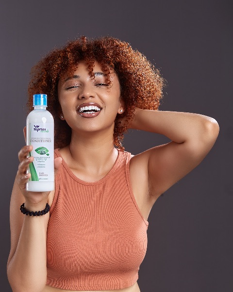 Haprians Detangling & Strengthening Conditioner image by Haprian Naturals