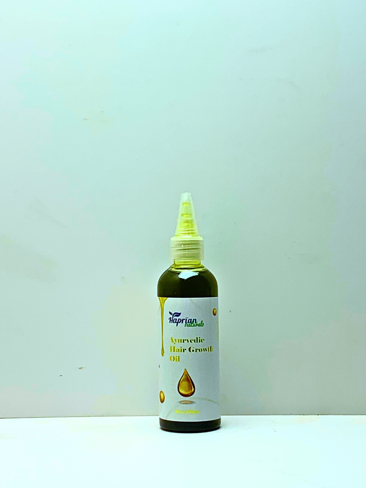 Aryuvedic Herbal Oil image by Haprian Naturals