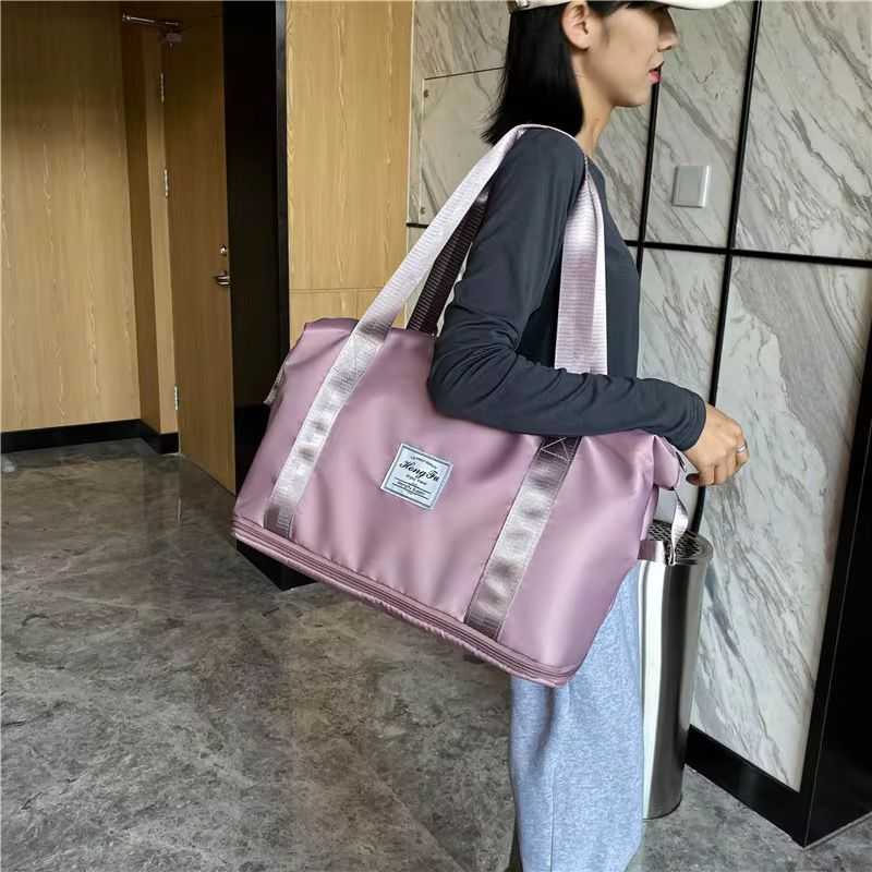 Travelling bag image by DBS MALL
