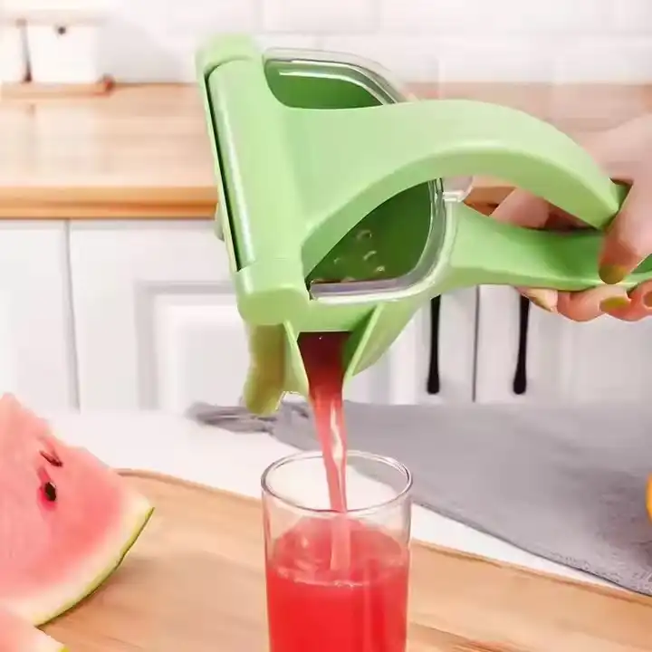 Hand press juicer image by DBS MALL