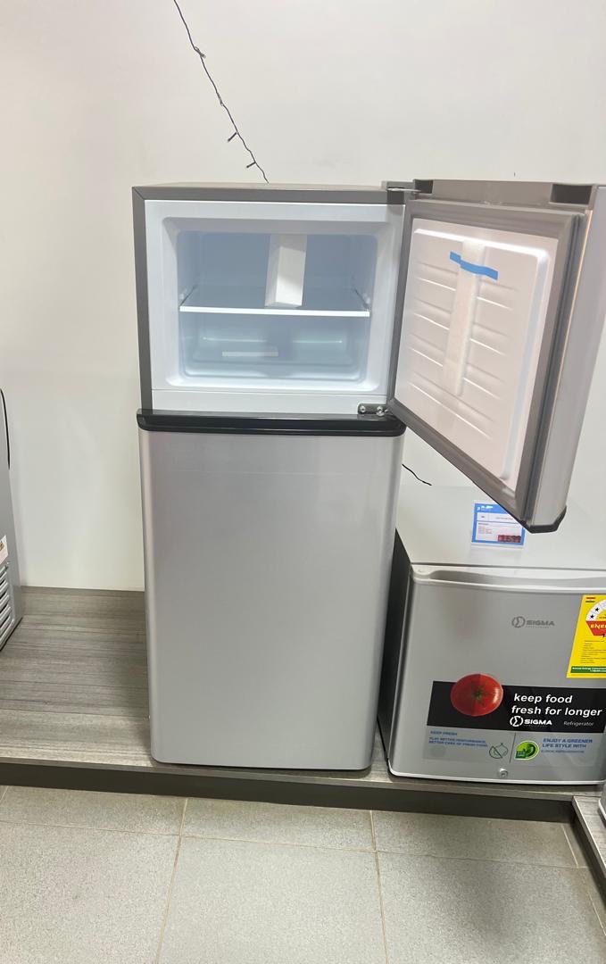 Sigma 118L fridge with top freezer image by Jude verse 20 enterprise